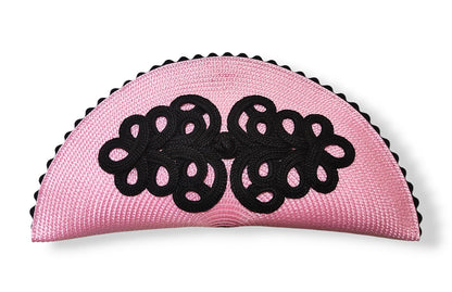 Bolso de nano rosa y negro adornado con alamar de pasamaería