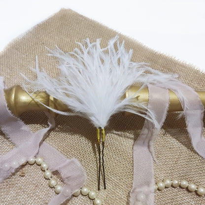 Horquilla de plumas de avestruz color blanco