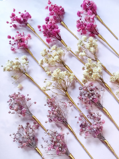 Muestrario de horquillas de paniculata preservada en tres degradados de color: rosa intenso, blanco crudo y rosa empolvado.